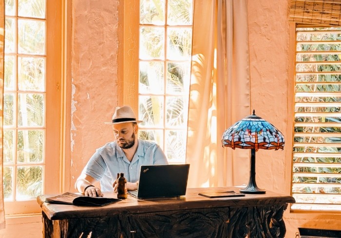 Couple enjoying private picnic on the cliffs at Great Huts romantic wellness escape